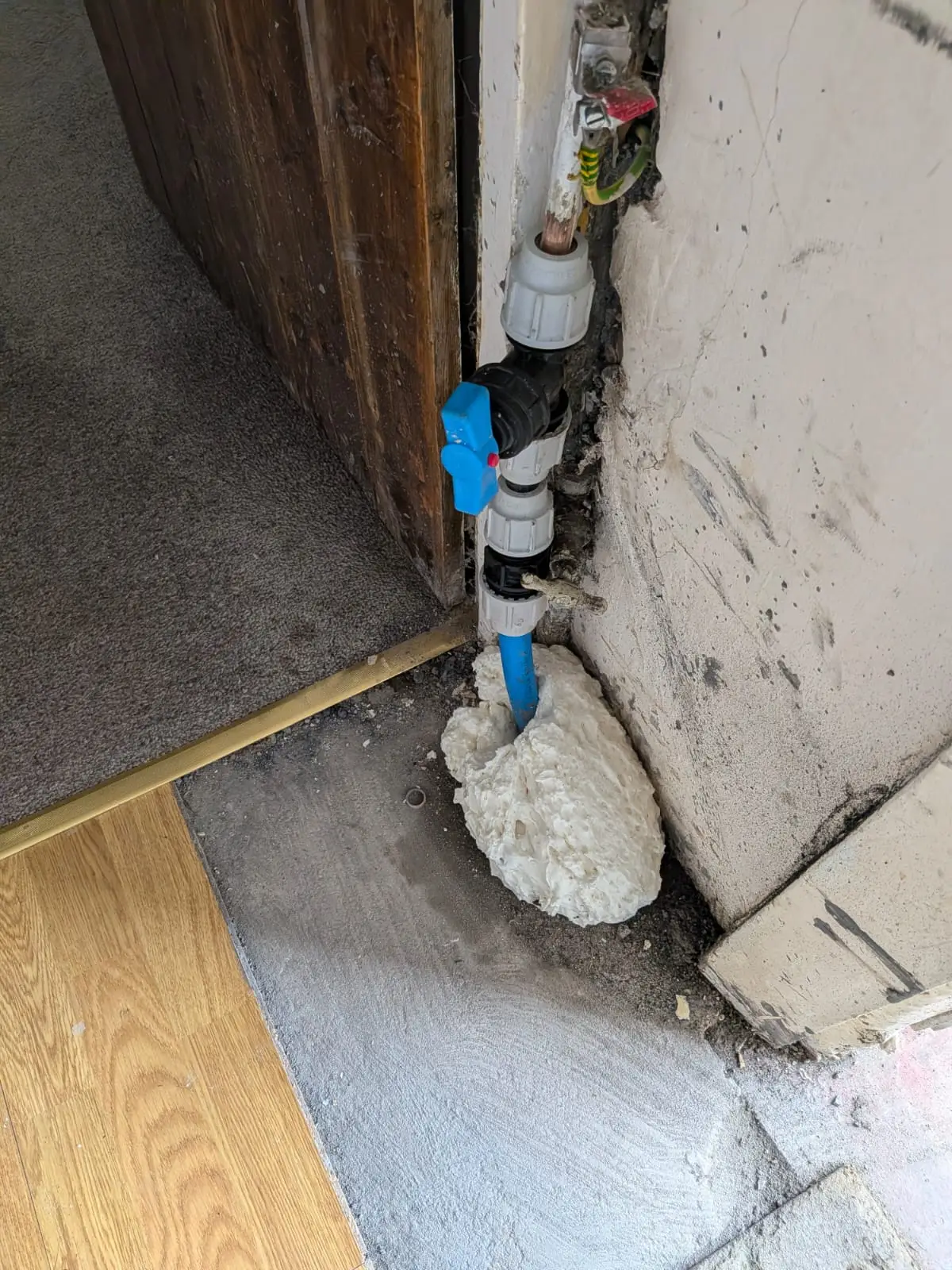 New stopcock and isolation valve fitted where the blue water main enters the building